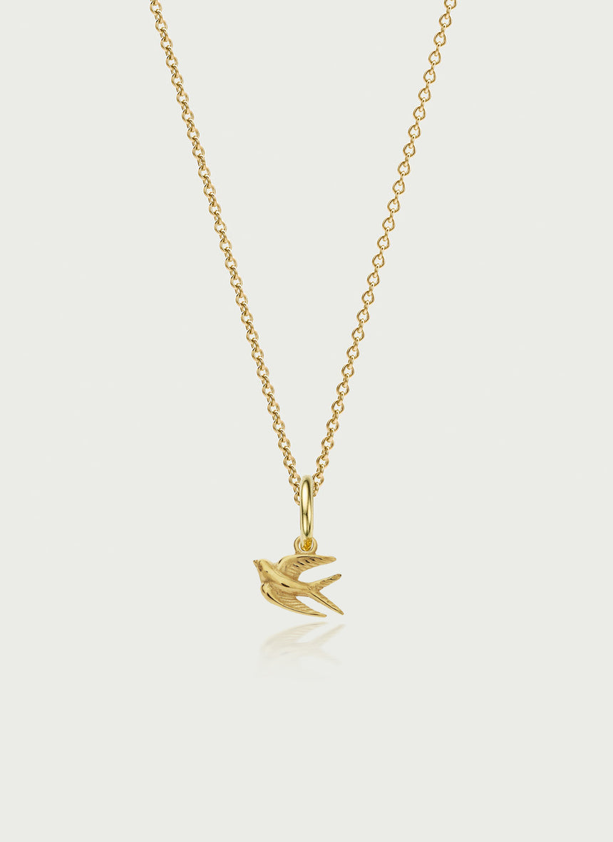 Little swallow charm 14k gold