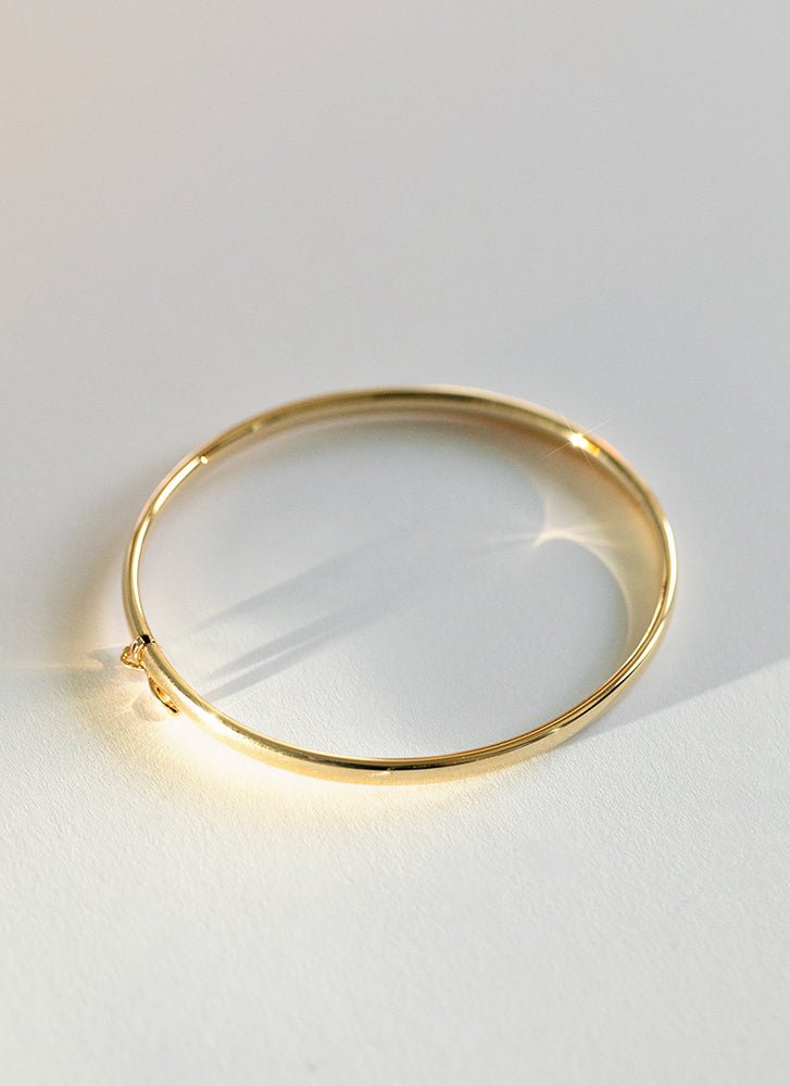 Classic oval 4mm bangle 14k gold