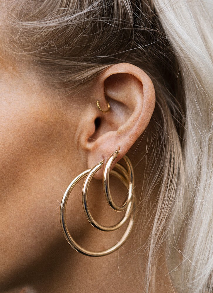 Pinhead earstud 14k gold