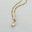 Mother of pearl charm 14k gold