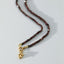 Rosie garnet necklace with front lock 14k gold
