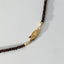 Rosie garnet necklace with front lock 14k gold