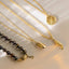 St. jacob scallop charm 14k gold - Studio Kroewe
