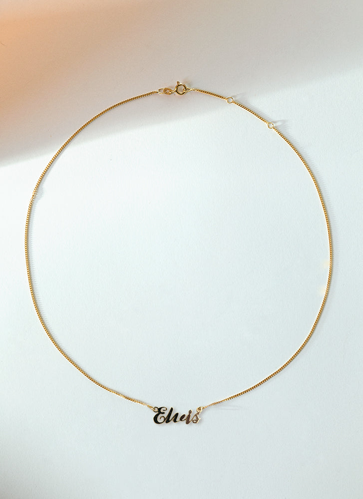 Carrie name necklace 14k gold