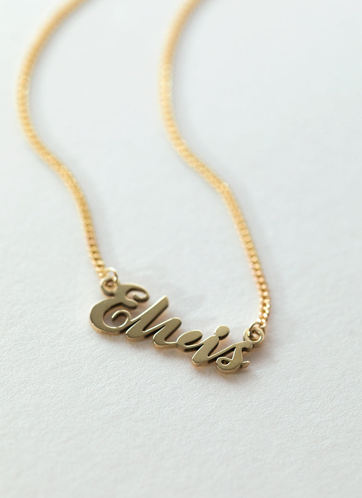 Carrie name necklace 14k gold