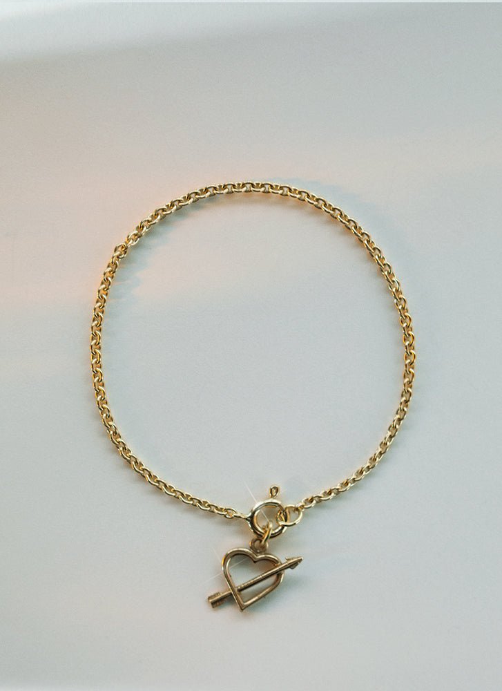 Cupid heart charm 14k gold - Studio Kroewe
