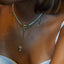 Feather charm 14k gold - Studio Kroewe