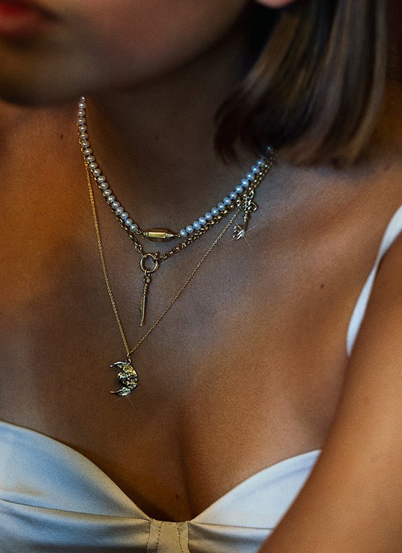 Feather charm 14k gold - Studio Kroewe