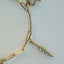 Feather charm 14k gold - Studio Kroewe