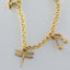 Saturn charm 14k gold - Studio Kroewe