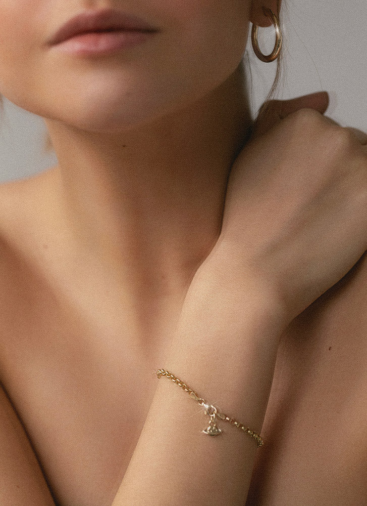 Saturn charm 14k gold - Studio Kroewe