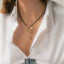 Saturn charm 14k gold - Studio Kroewe
